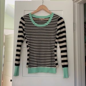 Black and white Striped sweater with green detail